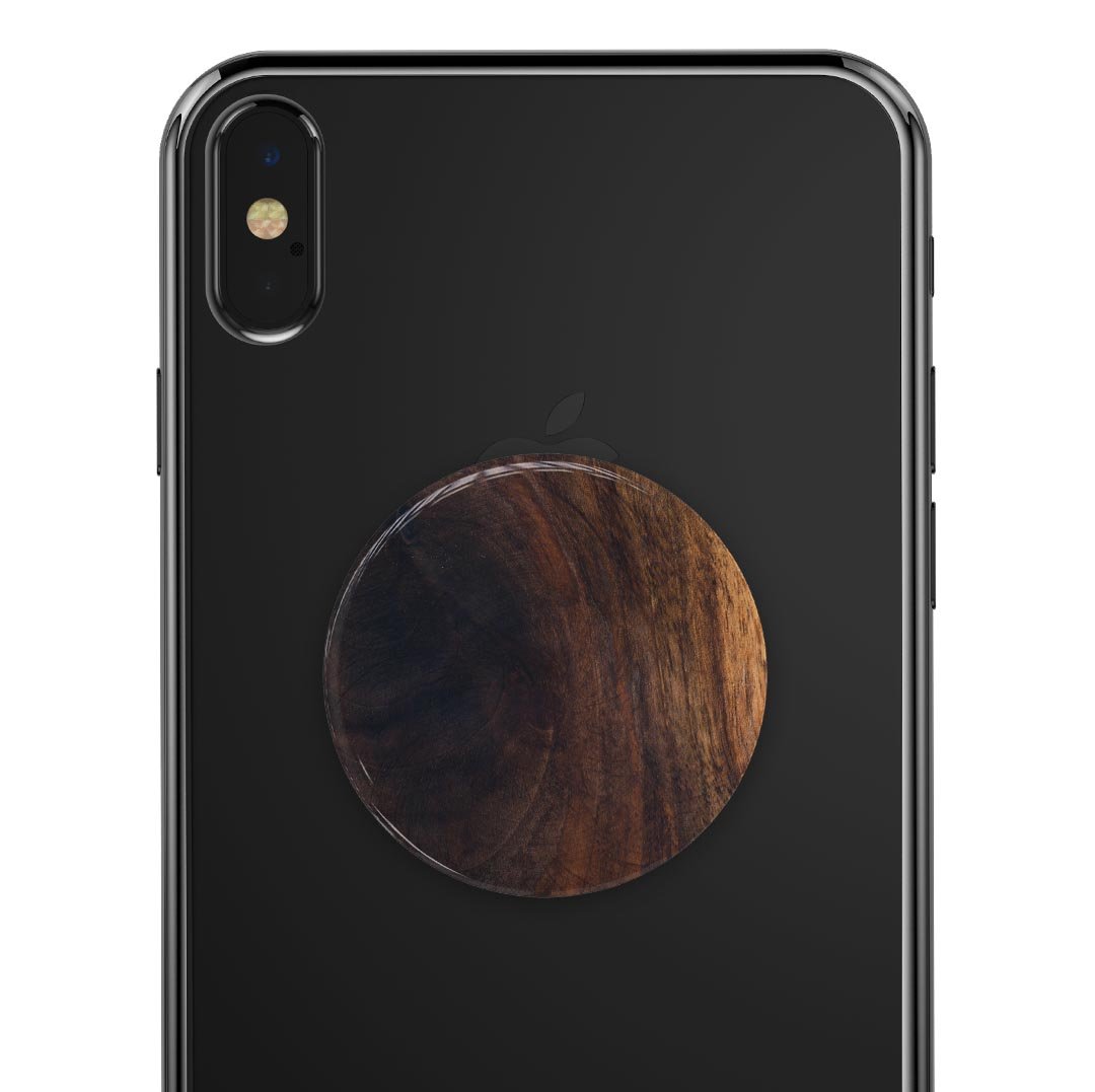 Knotted Rich Wood Plank Skin Kit for PopSockets, showcasing a stylish wood design on a smartphone grip.