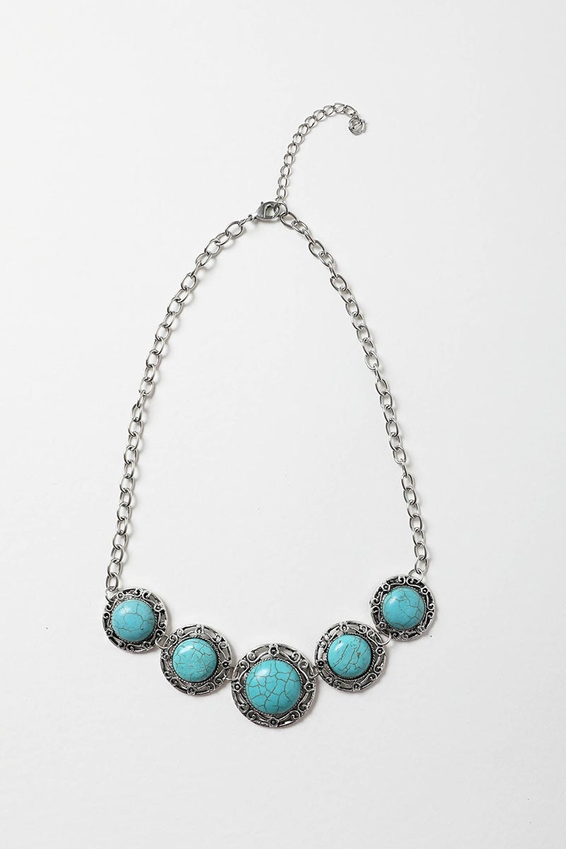 La Floraison Turquoise Necklace featuring hand-cut turquoise stones, elegantly designed for versatile styling.