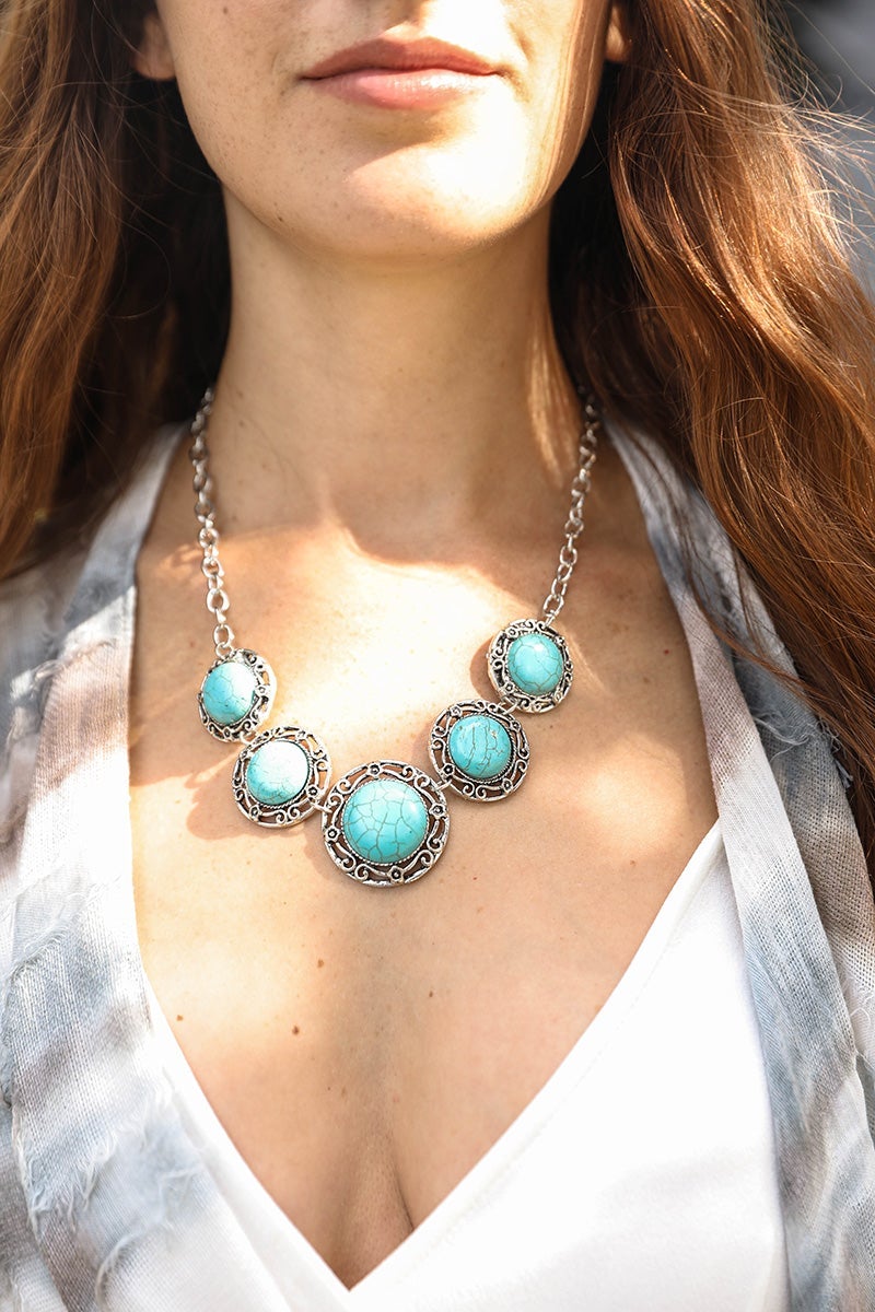 La Floraison Turquoise Necklace featuring hand-cut turquoise stones, elegantly designed for versatile styling.