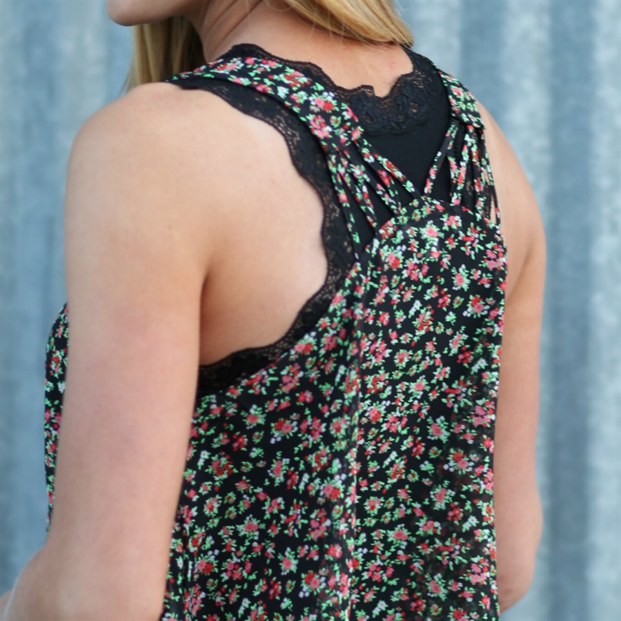 Lace Trim Racerback Tank featuring a stunning v-neck and scalloped lace detailing, perfect for layering and lounging.