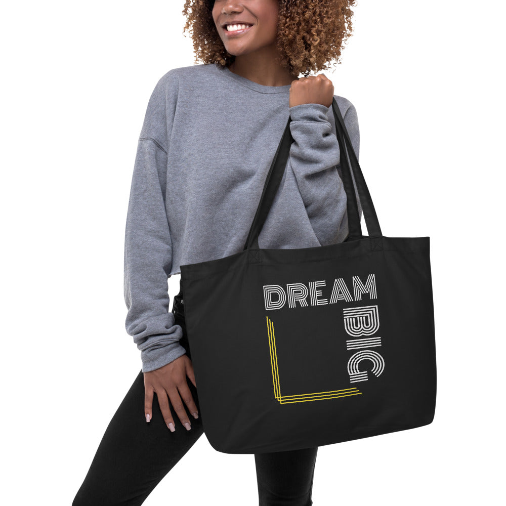 Large black tote bag featuring a Dream Big inspirational print, made of durable cotton twill with dual straps.