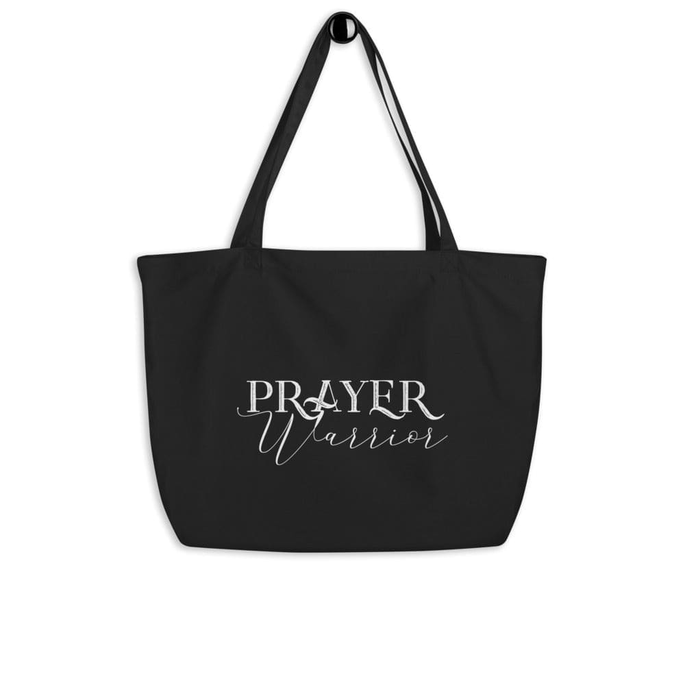 Large black tote bag with Prayer Warrior inspirational print, featuring durable cotton material and spacious design for everyday use.