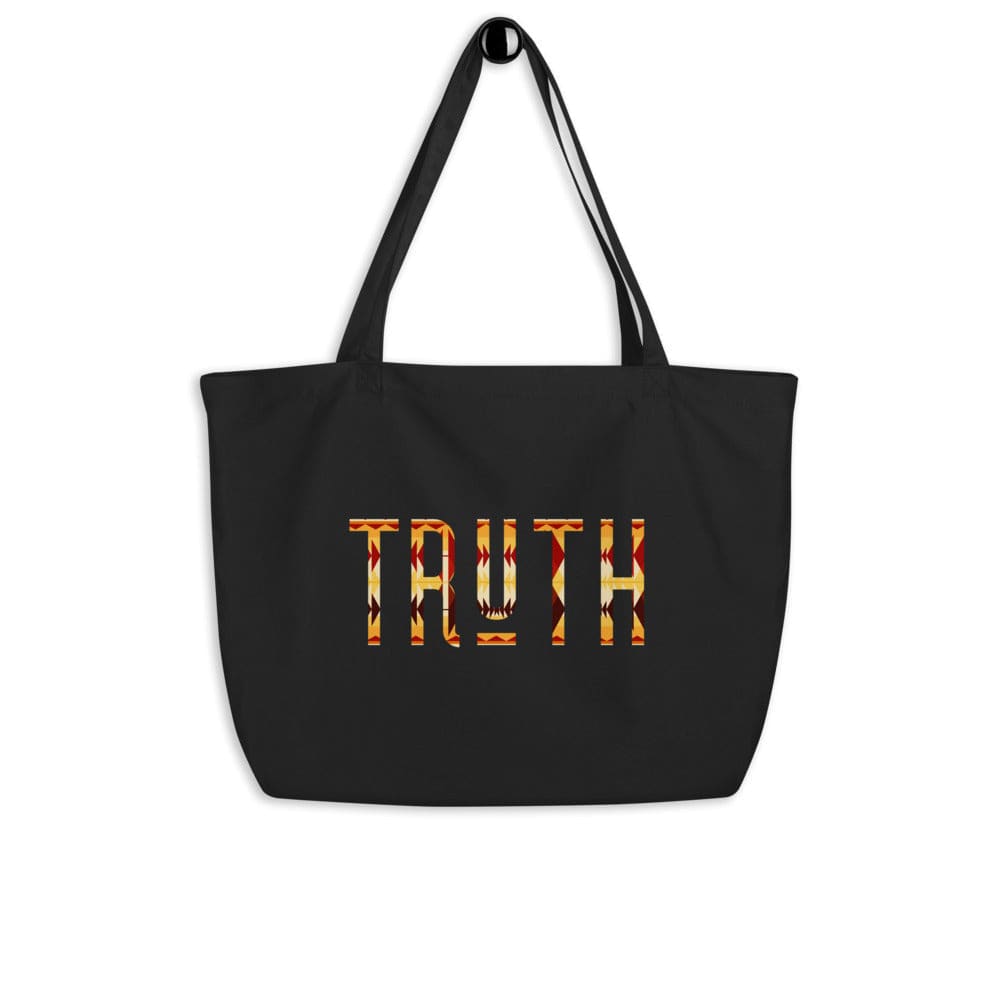 Large black tote bag featuring an inspirational print, made of durable cotton with dual straps for easy carrying.