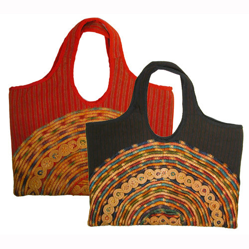 Large Joyabaj Handbag handmade from recycled huipils, showcasing vibrant colors and traditional Mayan patterns.