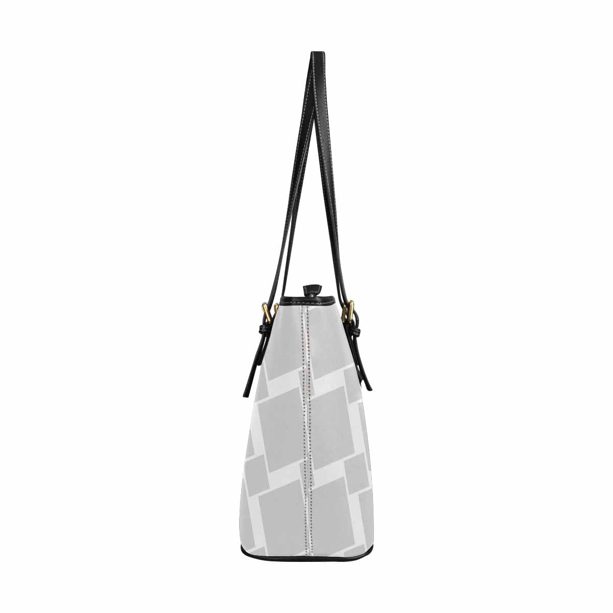 Large Grey Leather Tote Shoulder Bag with zipper closure and adjustable straps, showcasing its spacious interior and stylish design.