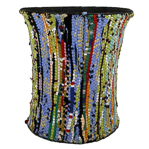 A large, colorful wastebasket made from recycled cloth scraps, showcasing unique patterns and vibrant colors, perfect for eco-friendly waste separation.