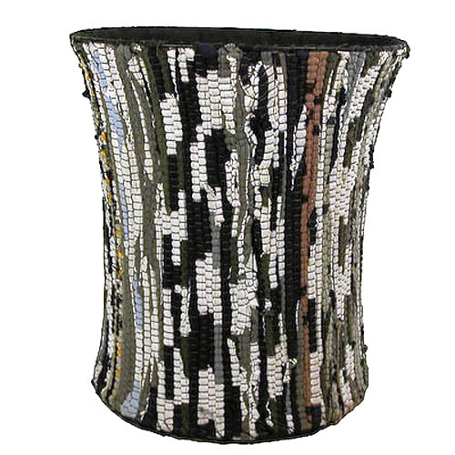 A large, colorful wastebasket made from recycled cloth scraps, showcasing unique patterns and vibrant colors, perfect for eco-friendly waste separation.