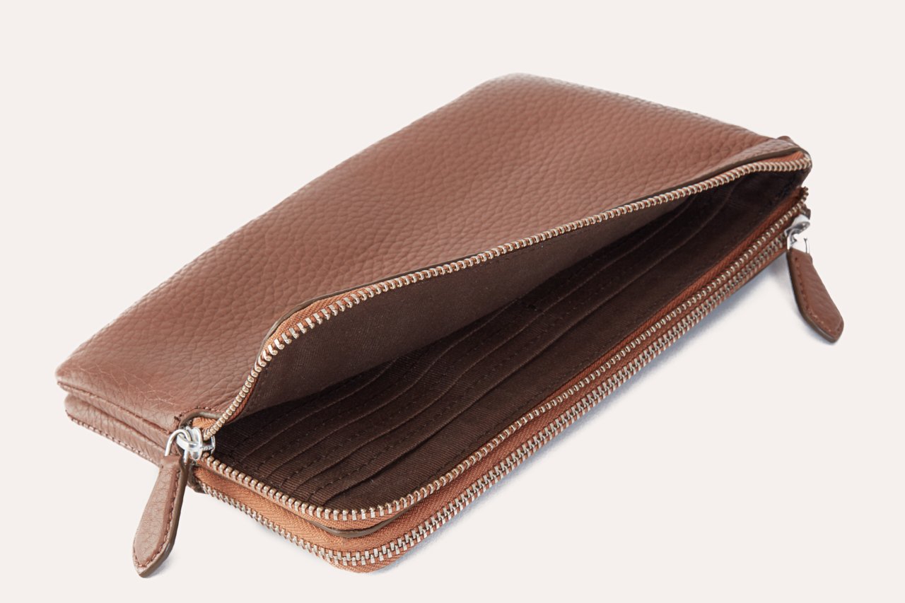 Large Wristlet made from genuine pebble leather with double zipper compartments, showcasing card slots and sleeve pockets.