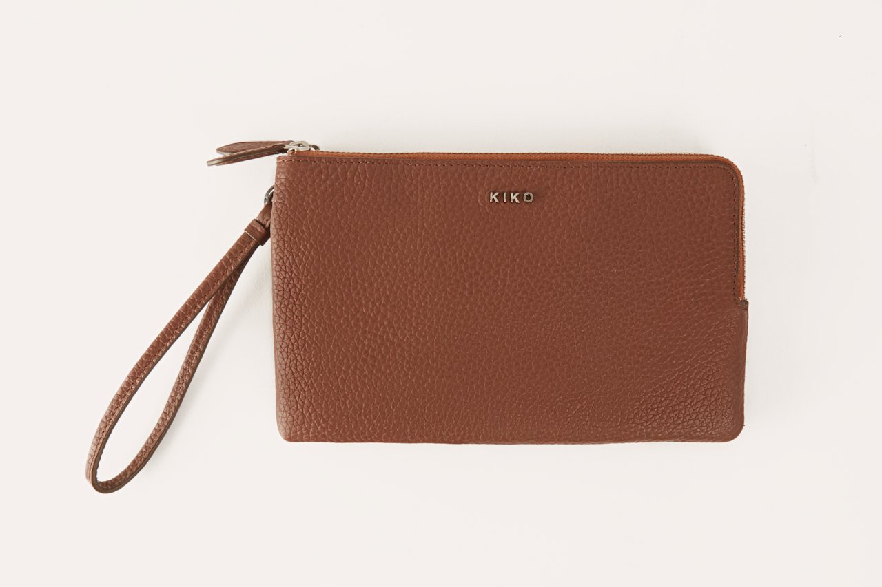 Large Wristlet made from genuine pebble leather with double zipper compartments, showcasing card slots and sleeve pockets.