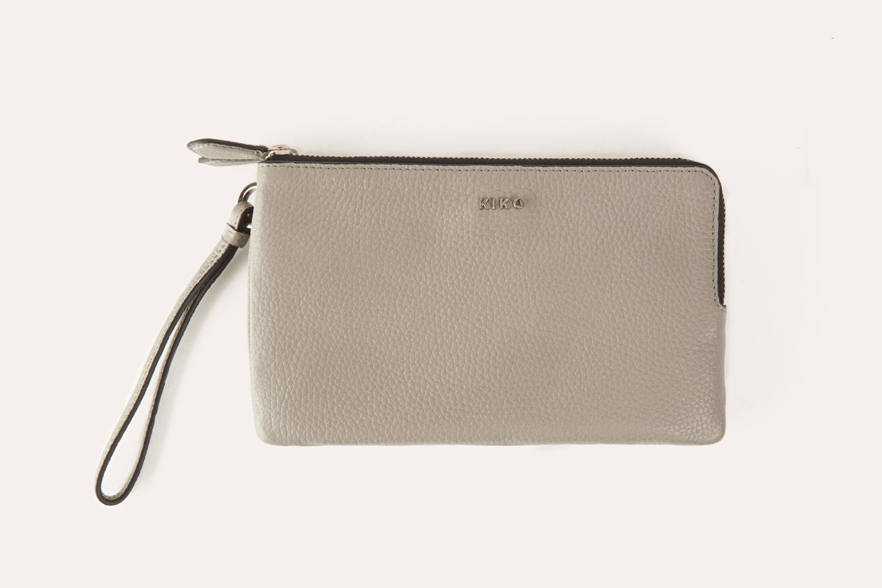 Large Wristlet made from genuine pebble leather with double zipper compartments, showcasing card slots and sleeve pockets.