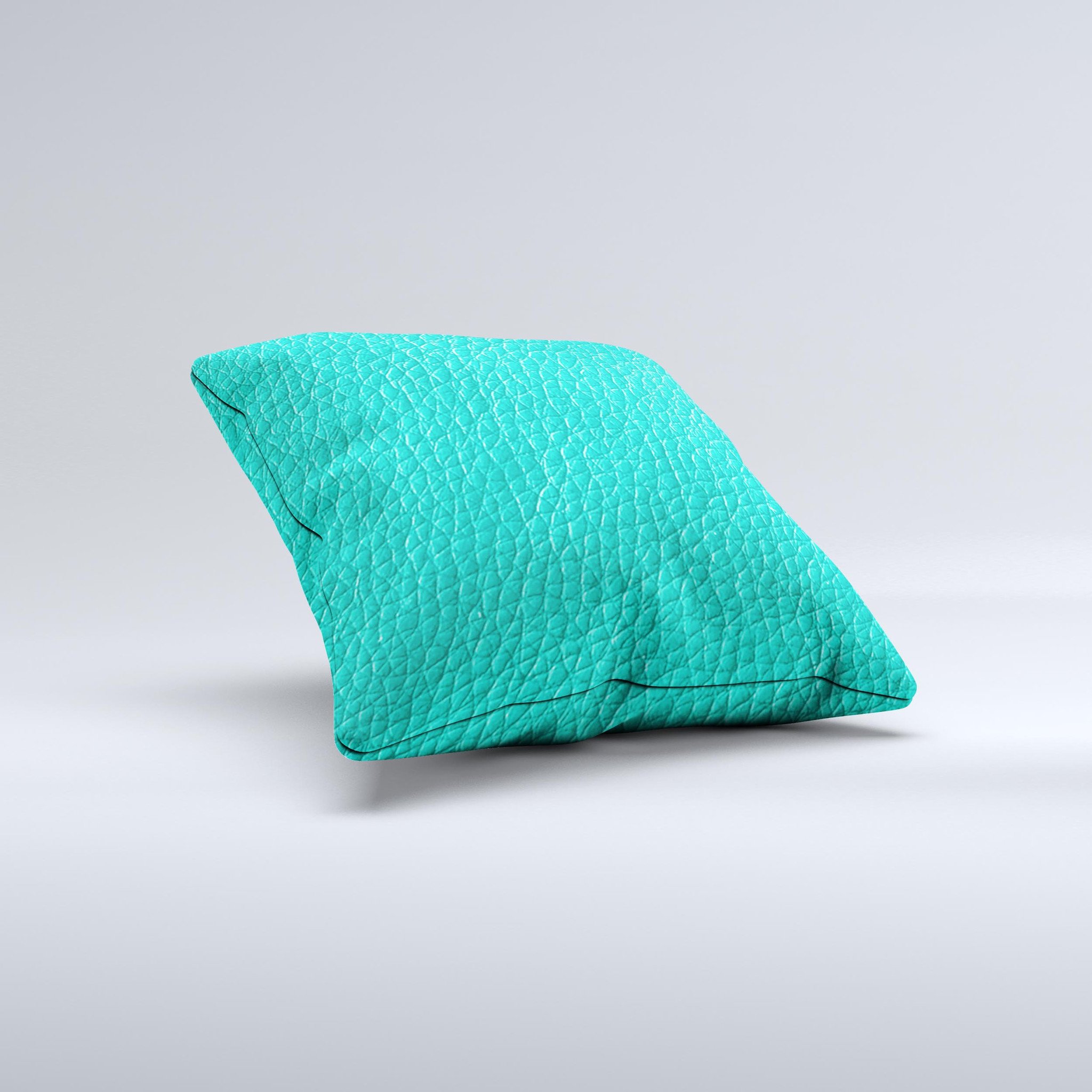 Light teal leather decorative throw pillow with unique ink-fuzed design, handcrafted in Virginia.