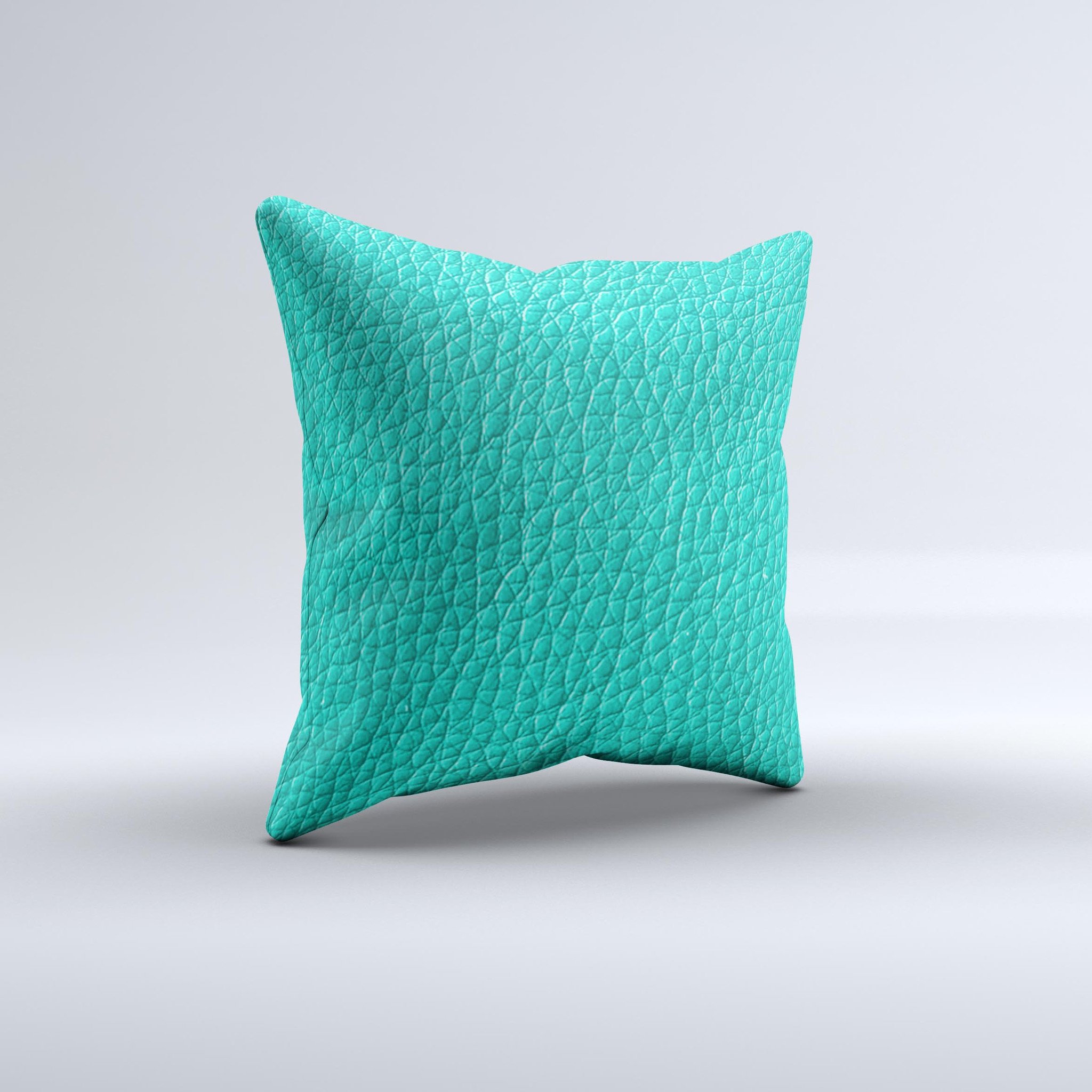 Light teal leather decorative throw pillow with unique ink-fuzed design, handcrafted in Virginia.