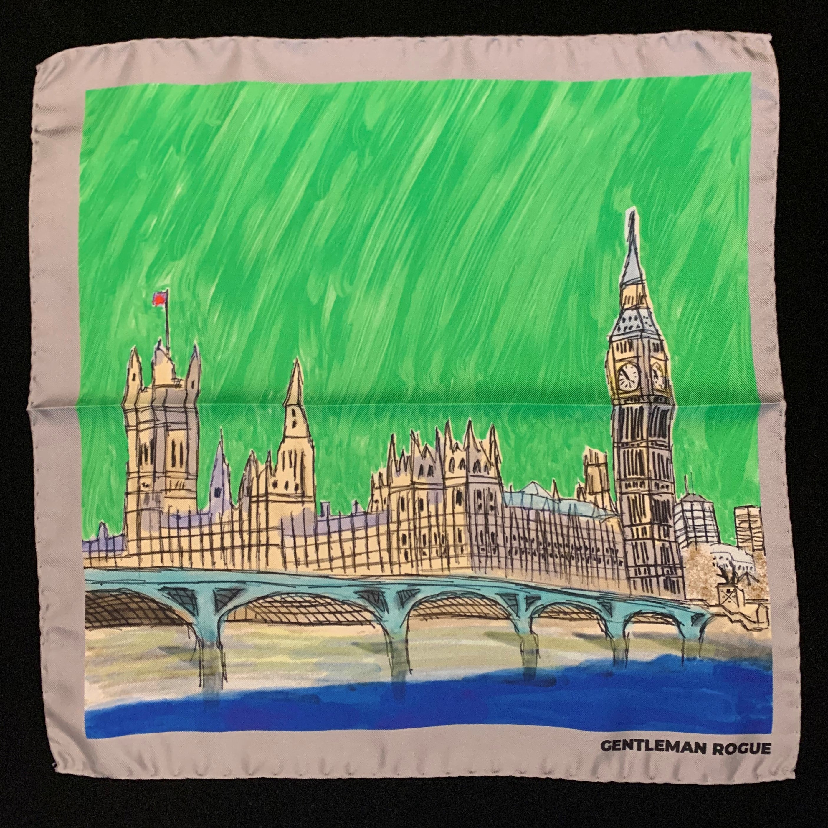 Elegant silver pocket square featuring a hand sketched design of the Palace of Westminster with a silver border.