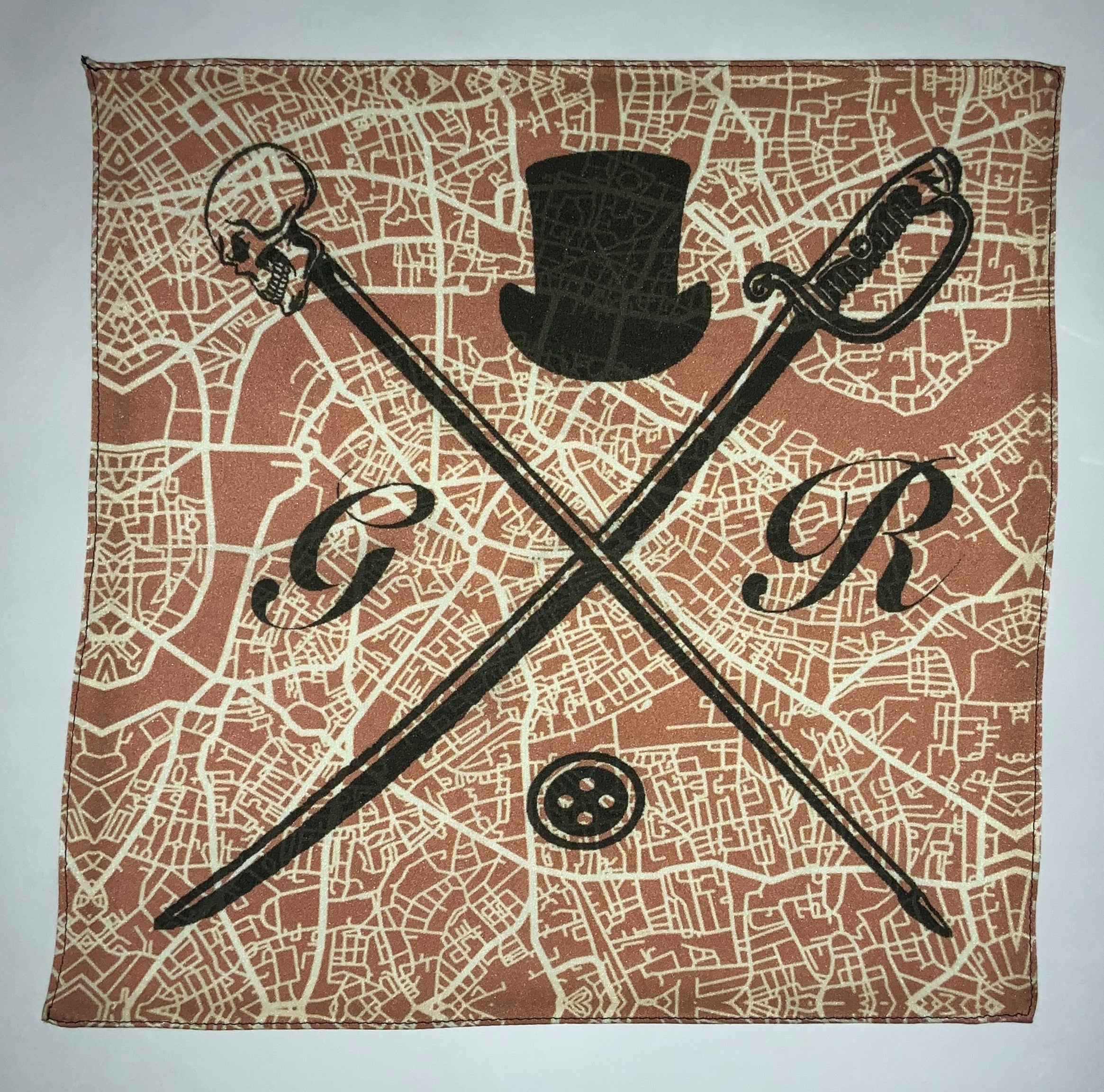 A vintage ladies scarf featuring a detailed London street map design in soft shades, adorned with the Gentleman Rogue logo.