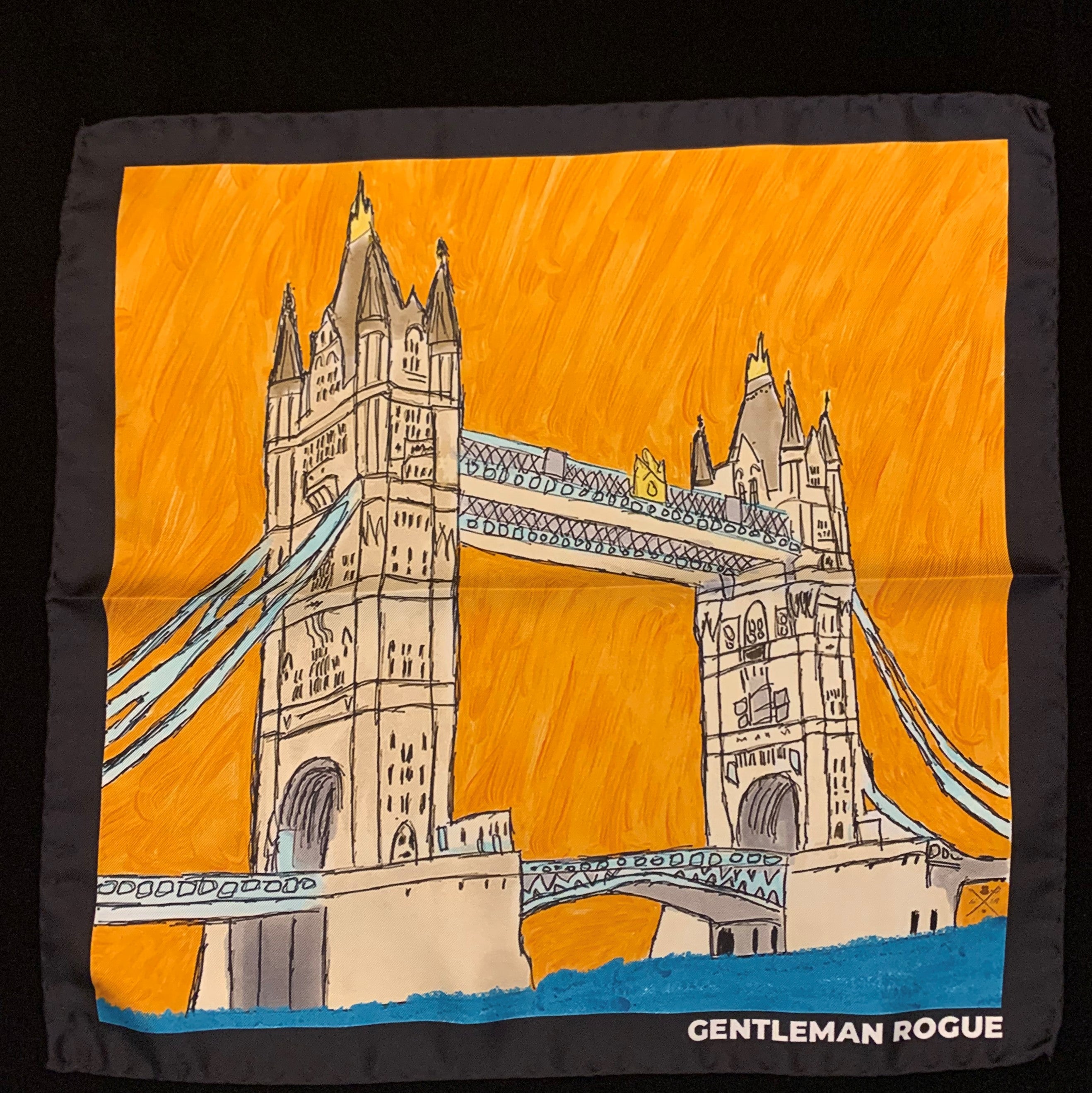 London Tower Bridge Black Pocket Square featuring hand sketched design in burnt orange and sandstone colors on luxurious silk.