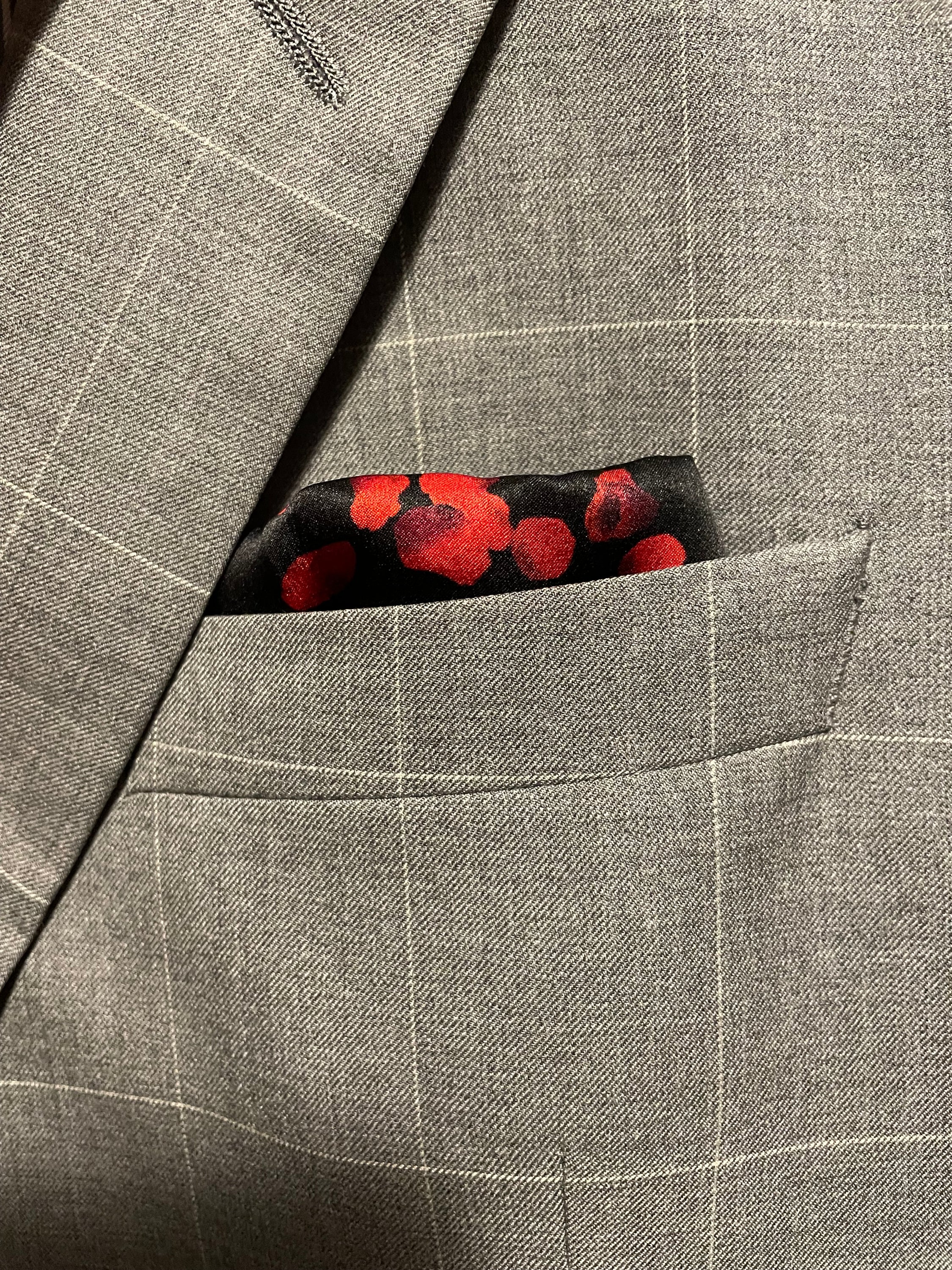 Love Knows No Borders Pocket Square featuring falling rose petals, symbolizing love and unity.