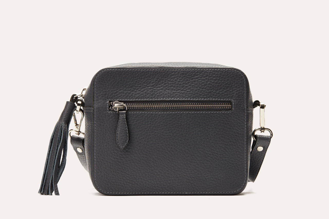 Loveable Crossbody bag made from genuine pebble leather, featuring an adjustable strap and internal card slots.