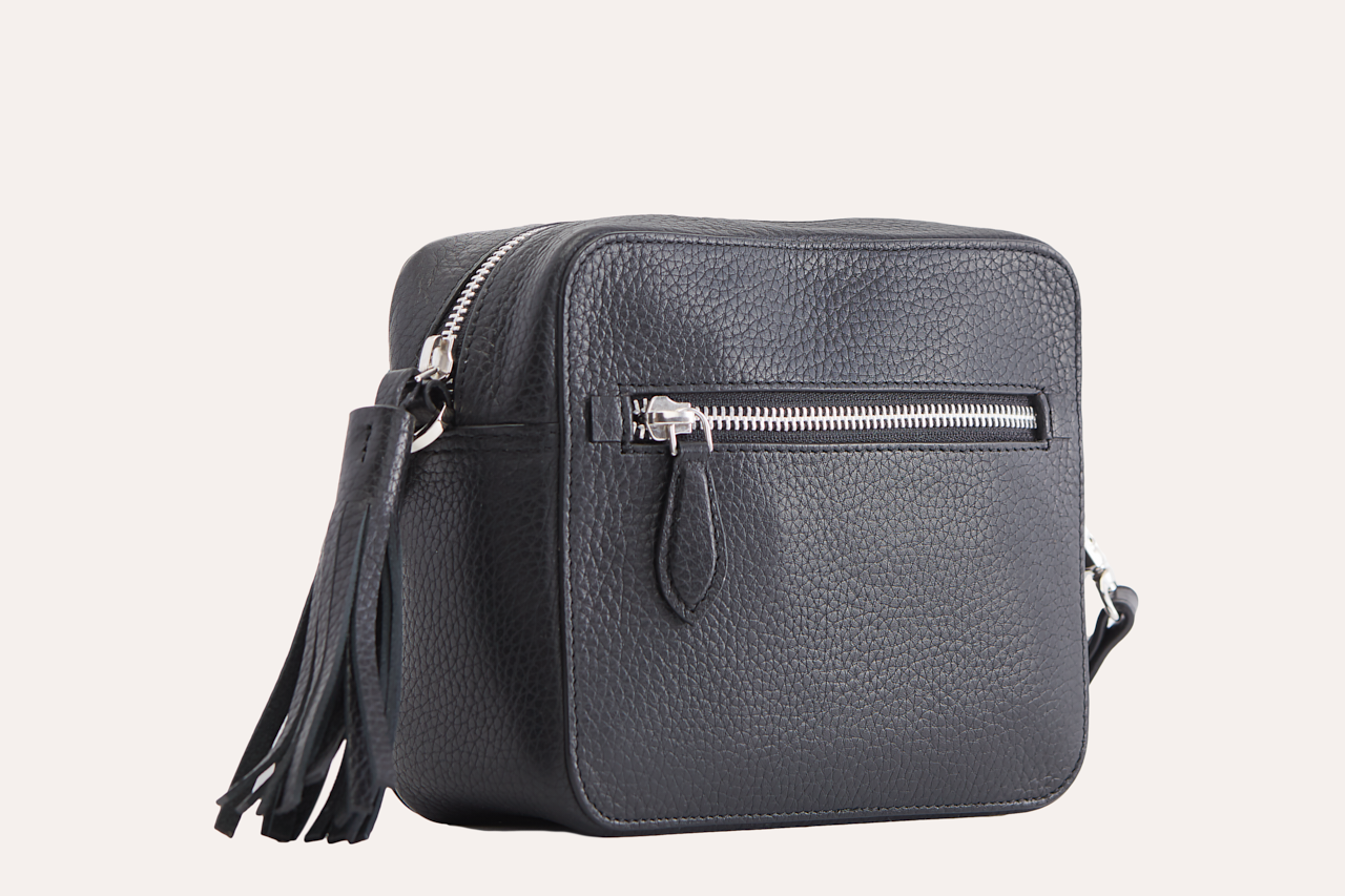 Loveable Crossbody bag made from genuine pebble leather, featuring an adjustable strap and internal card slots.