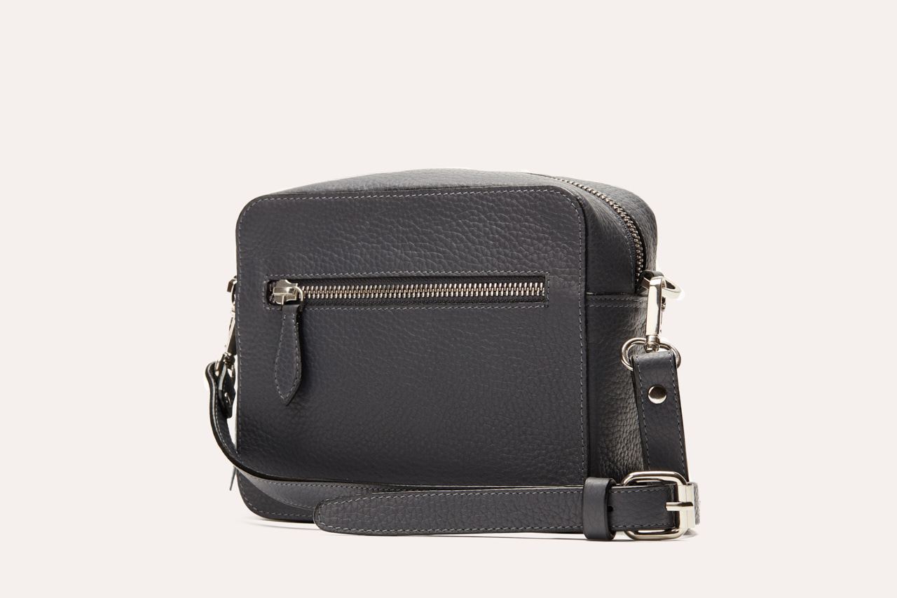 Loveable Crossbody bag made from genuine pebble leather, featuring an adjustable strap and internal card slots.