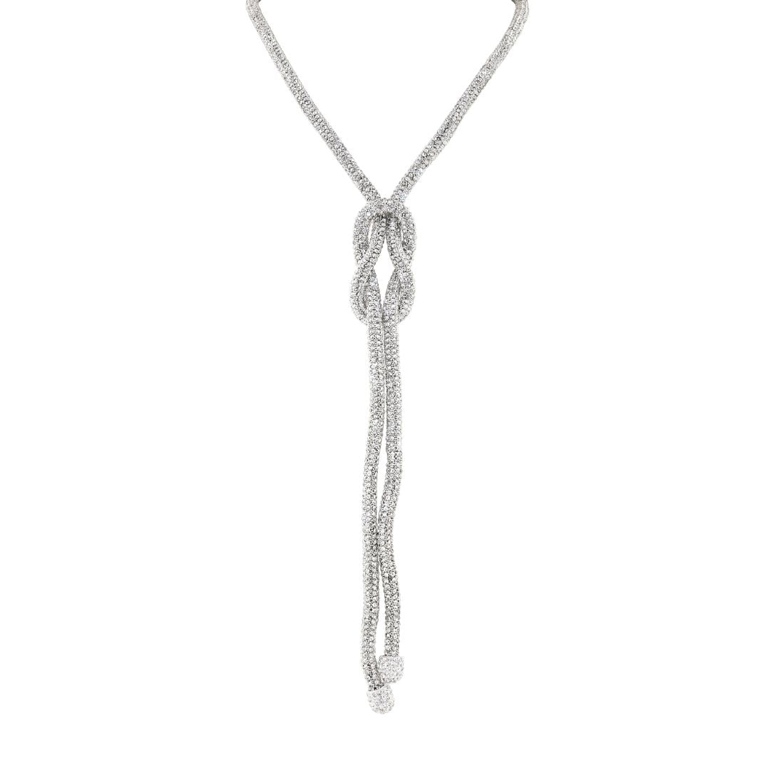 loveRocks Long Crystal Mesh Knot Necklace featuring a chic knot design and sparkling crystals on a slinky mesh chain.