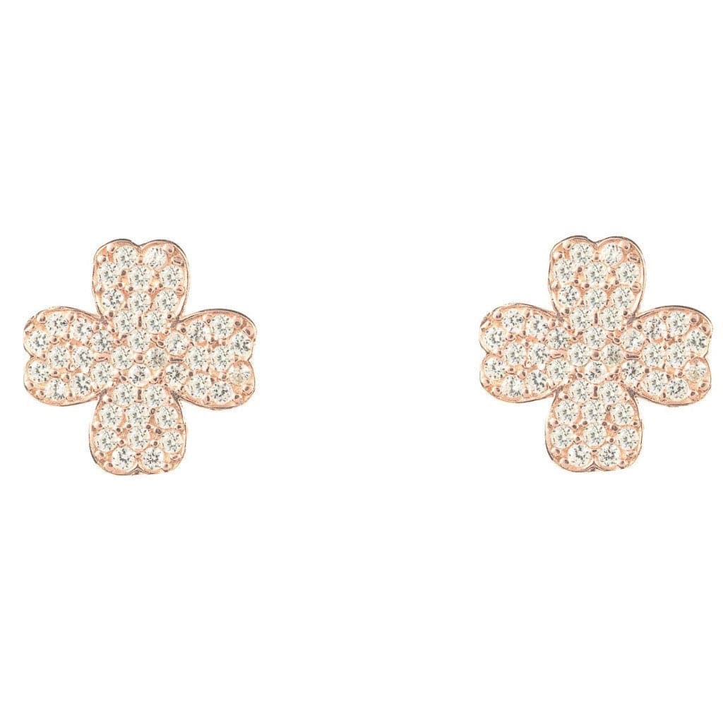 A pair of elegant lucky four leaf clover earrings made from sterling silver, adorned with sparkling cubic zirconia stones, showcasing a dainty design.