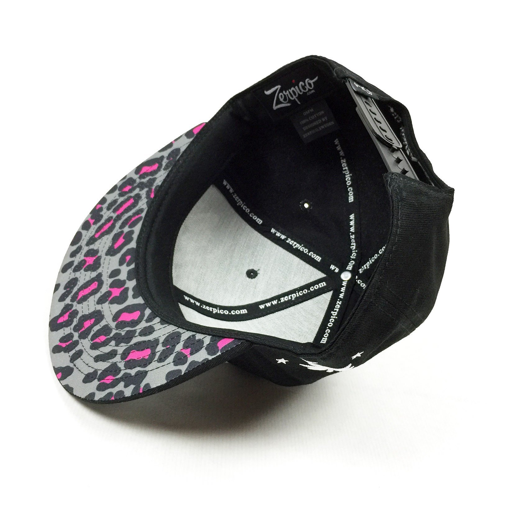 Lynx Snapback featuring a vibrant leopard pattern with 3D embroidery on the front, back, and side, showcasing its stylish design.