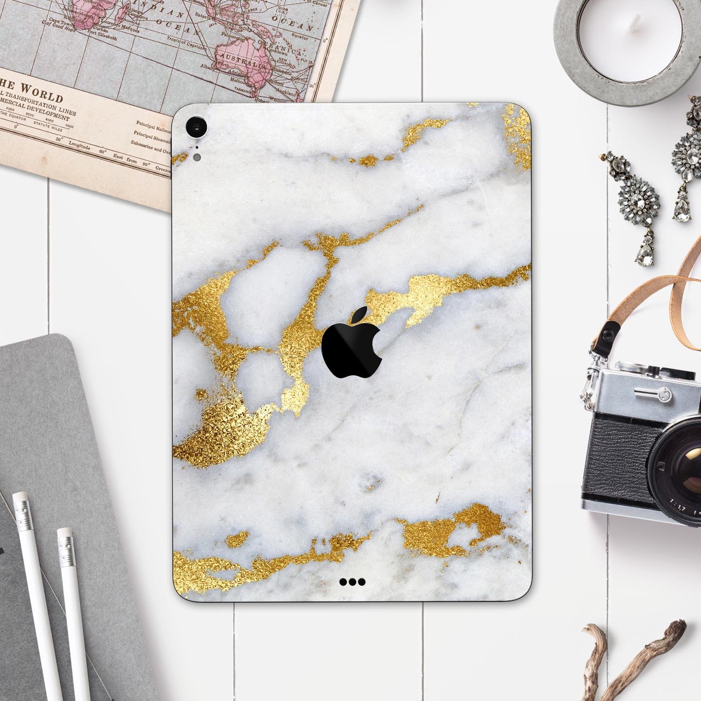 Marble and digital gold foil skin decal for Apple devices, showcasing a stylish design with premium 3M materials.