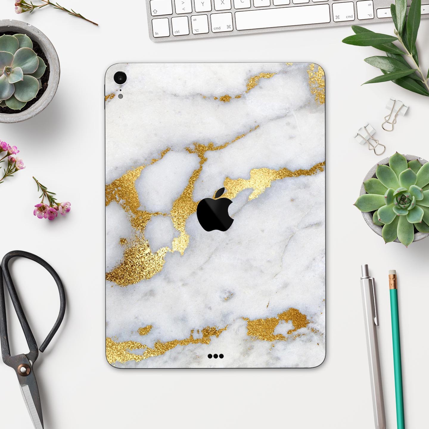 Marble and digital gold foil skin decal for Apple devices, showcasing a stylish design with premium 3M materials.