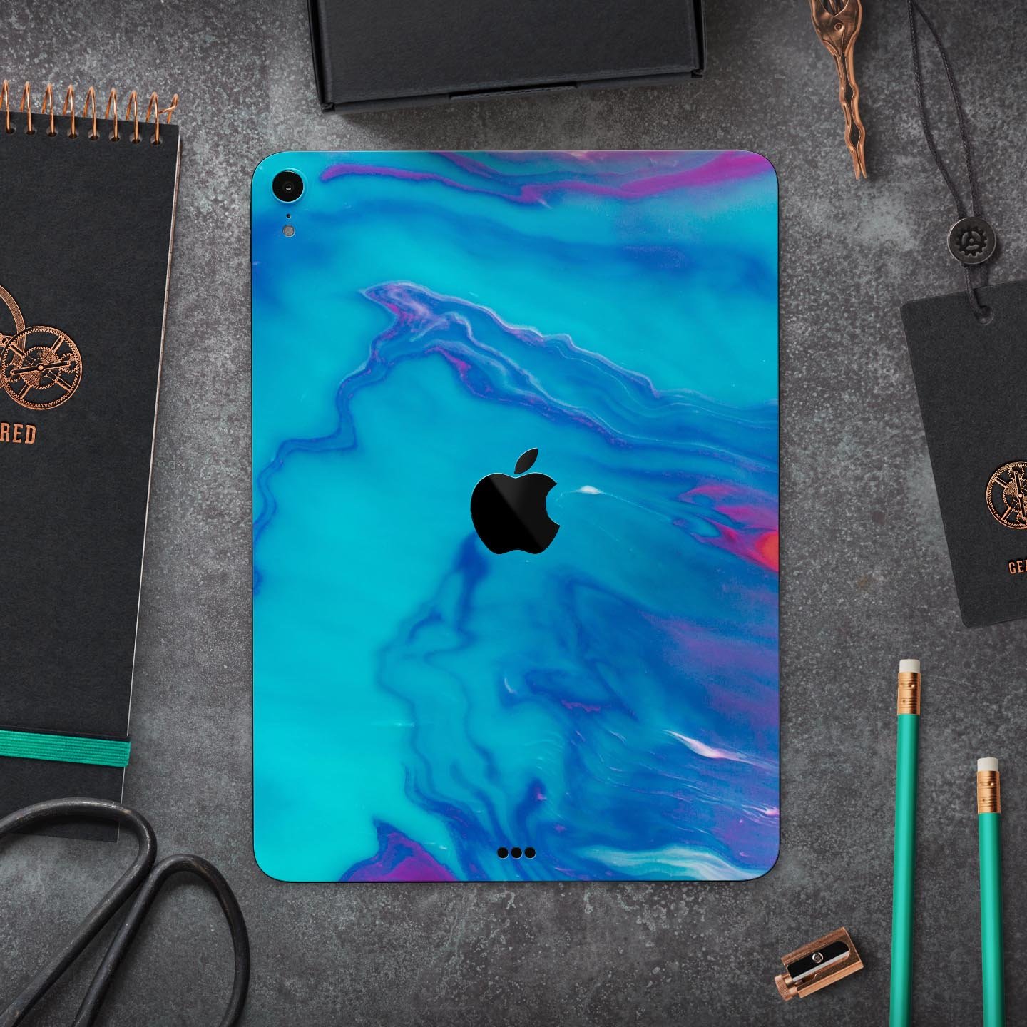 Marbleized Ocean Blue full body skin decal for Apple iPad Pro, showcasing a stylish marble pattern and premium finish.