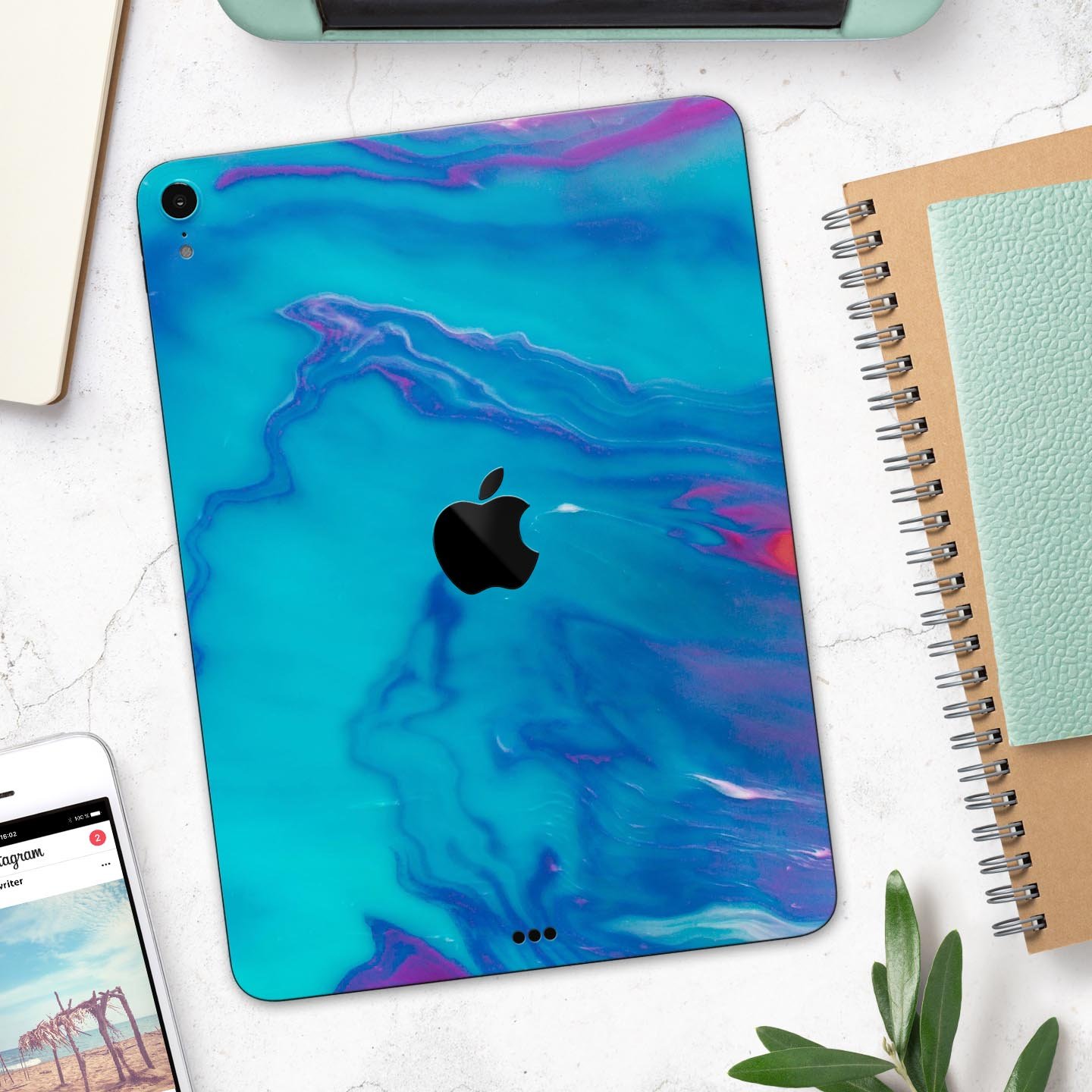 Marbleized Ocean Blue full body skin decal for Apple iPad Pro, showcasing a stylish marble pattern and premium finish.