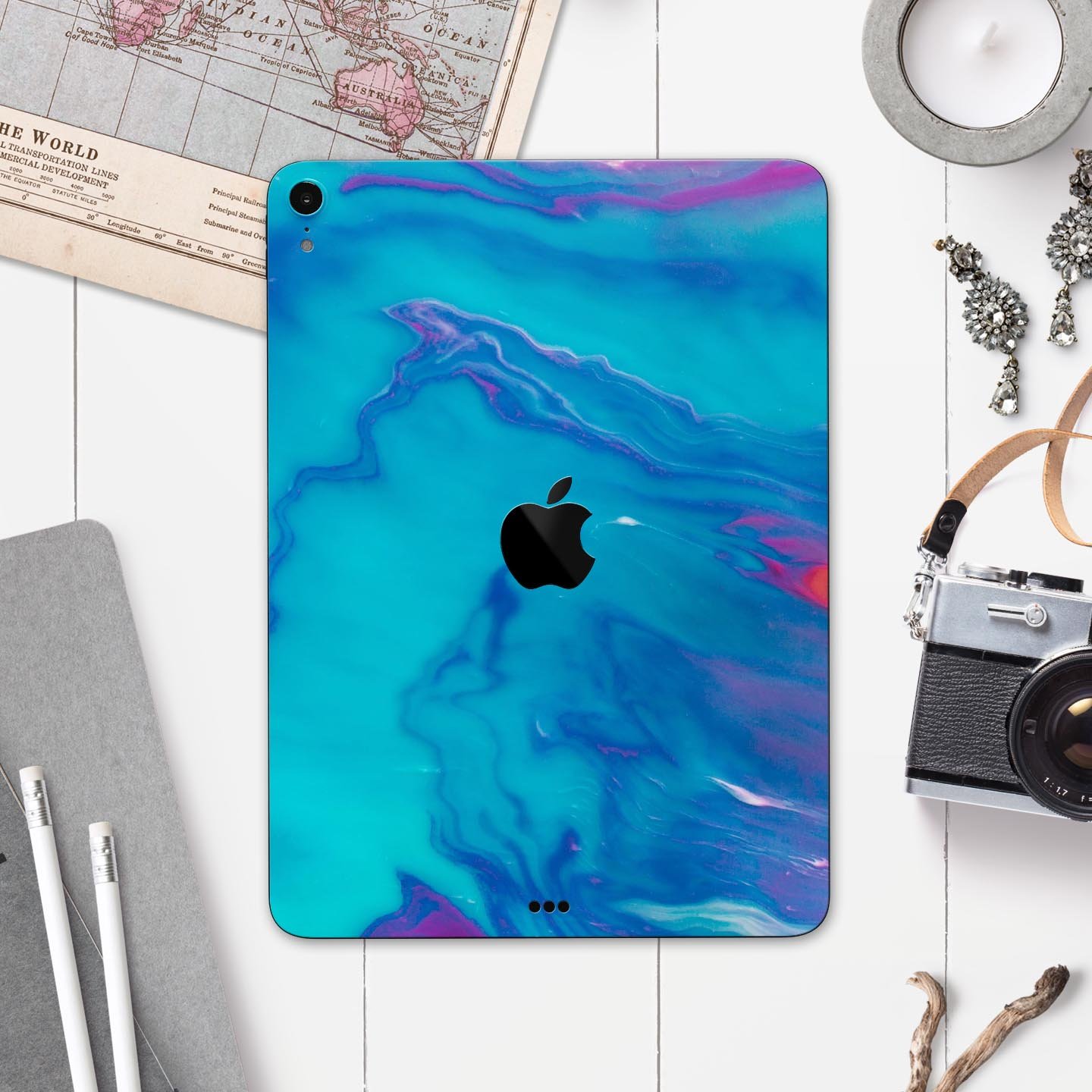 Marbleized Ocean Blue full body skin decal for Apple iPad Pro, showcasing a stylish marble pattern and premium finish.