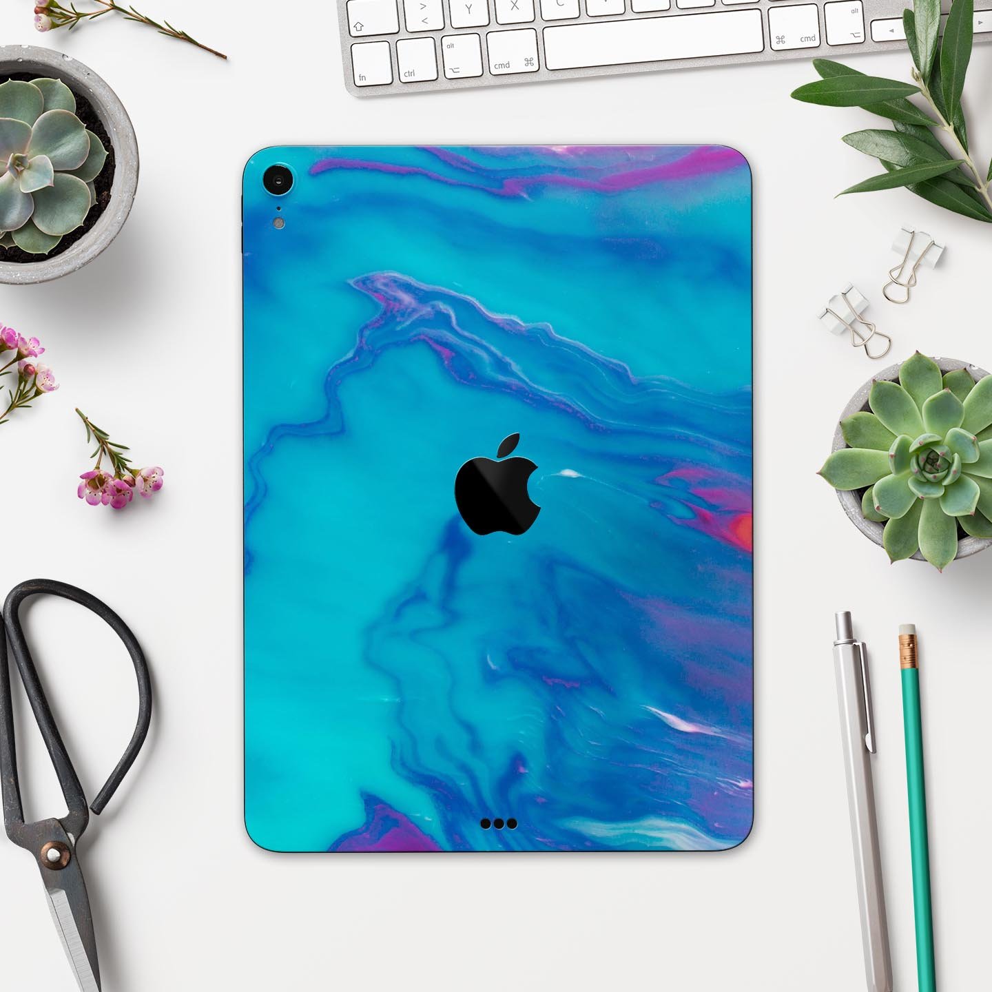 Marbleized Ocean Blue full body skin decal for Apple iPad Pro, showcasing a stylish marble pattern and premium finish.