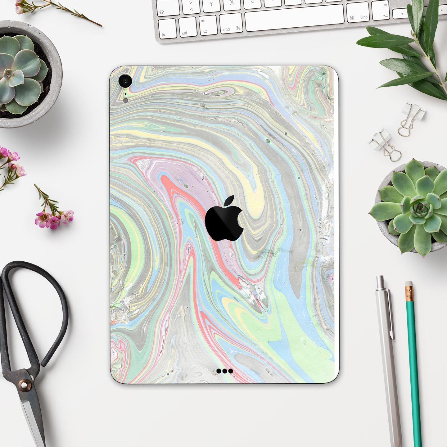 Marbleized Swirling Colors v2 skin decal for Apple devices, showcasing vibrant colors and a sleek design.