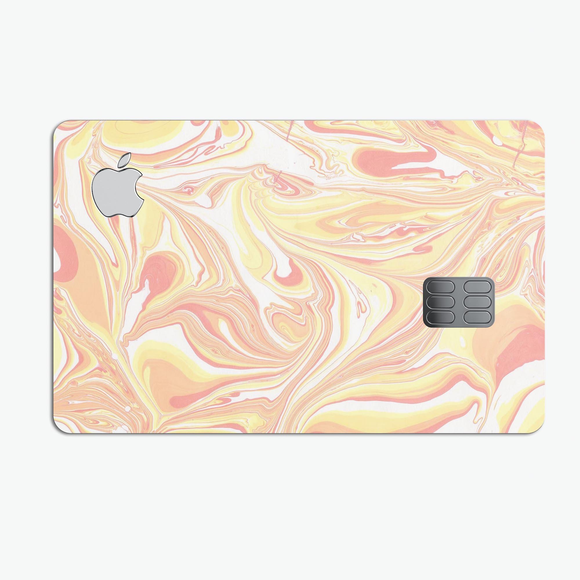 Marbleized Swirling Coral and Yellow Premium Protective Decal for Apple Card, showcasing vibrant colors and a stylish design.