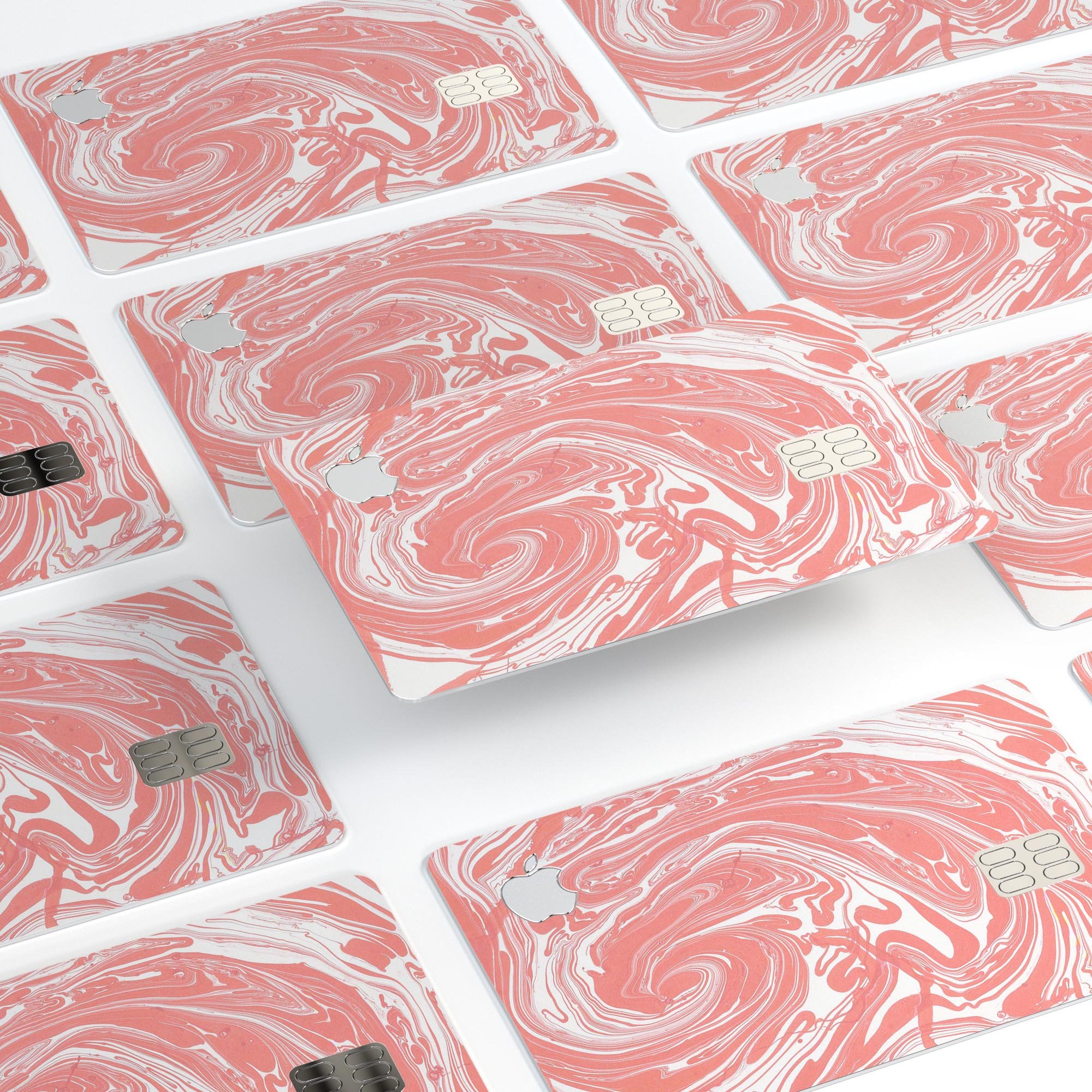 Marbleized Swirling Coral decal skin for Apple Card, showcasing vibrant colors and a protective design.