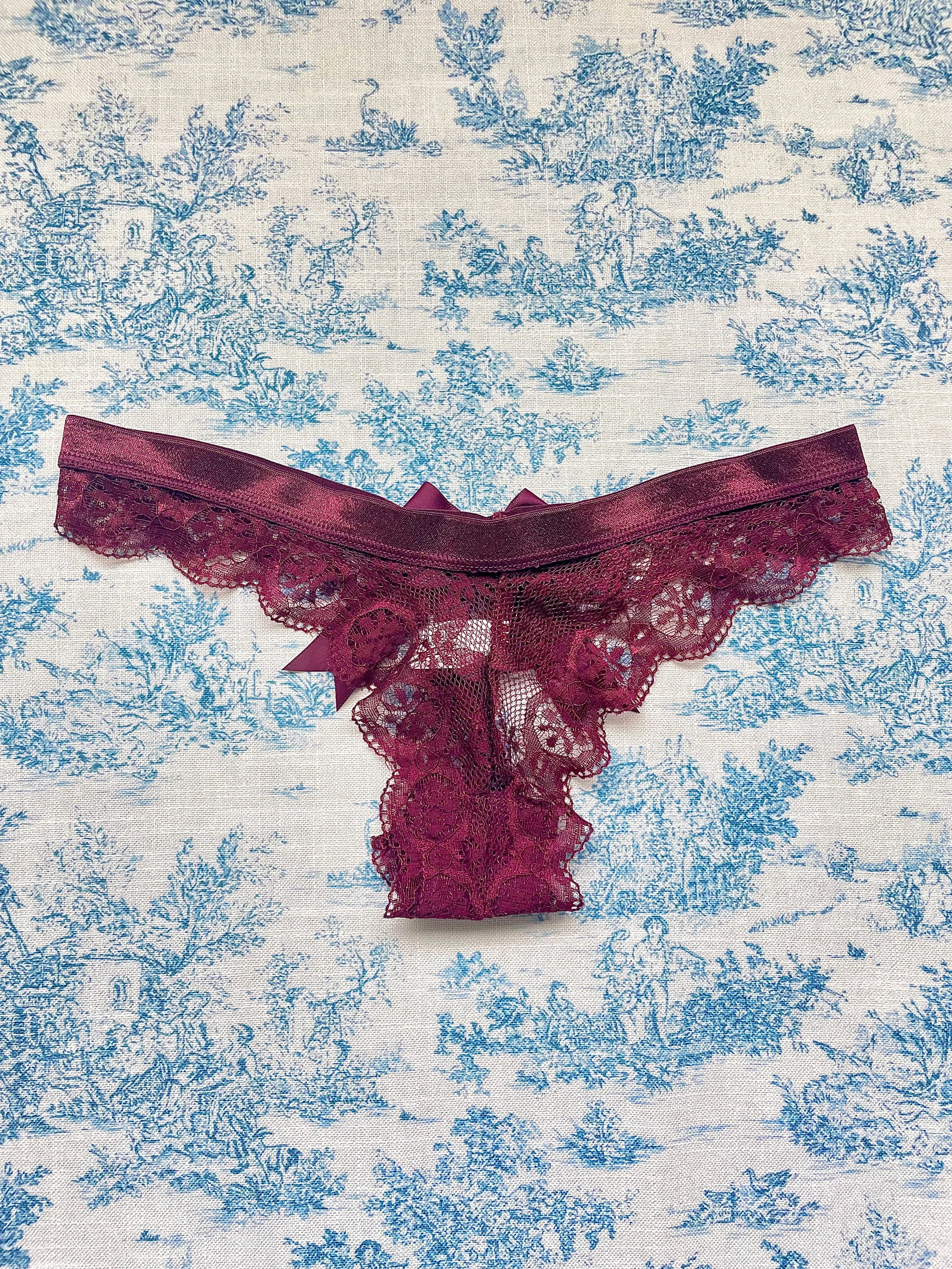 Maroon Lace Bow Panty featuring intricate lace design and satin bow detail, perfect for elegant lingerie collections.