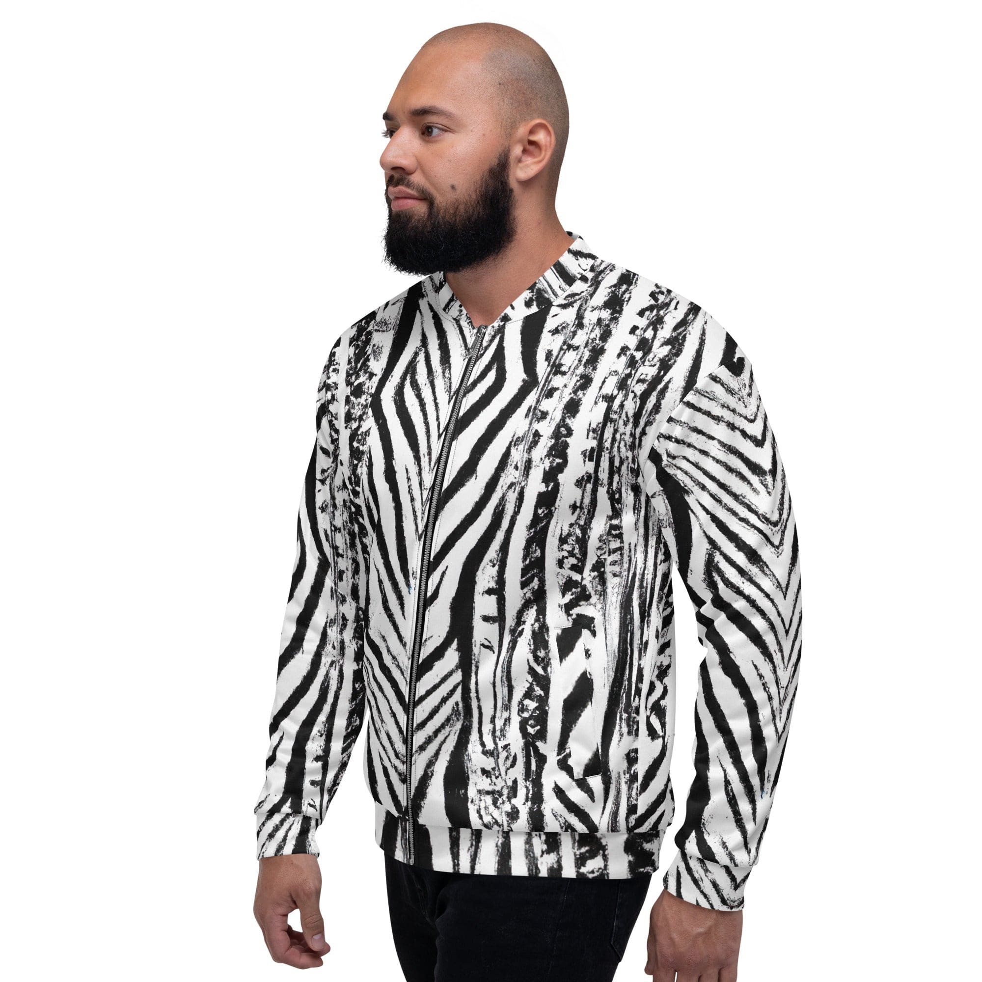 Men's bomber jacket featuring a black and white native print, zip-front closure, and ribbed cuffs, showcasing its stylish design and multiple pockets.