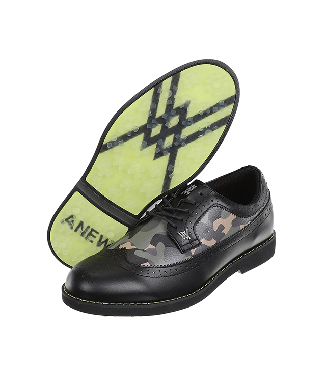 Men's black camo wingtip brogue shoes featuring natural cowhide leather and synthetic leather accents, showcasing a stylish design.