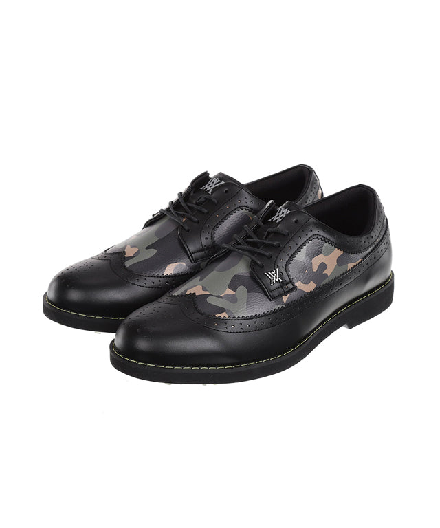 Men's black camo wingtip brogue shoes featuring natural cowhide leather and synthetic leather accents, showcasing a stylish design.