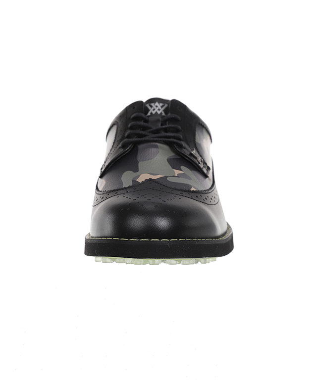 Men's black camo wingtip brogue shoes featuring natural cowhide leather and synthetic leather accents, showcasing a stylish design.