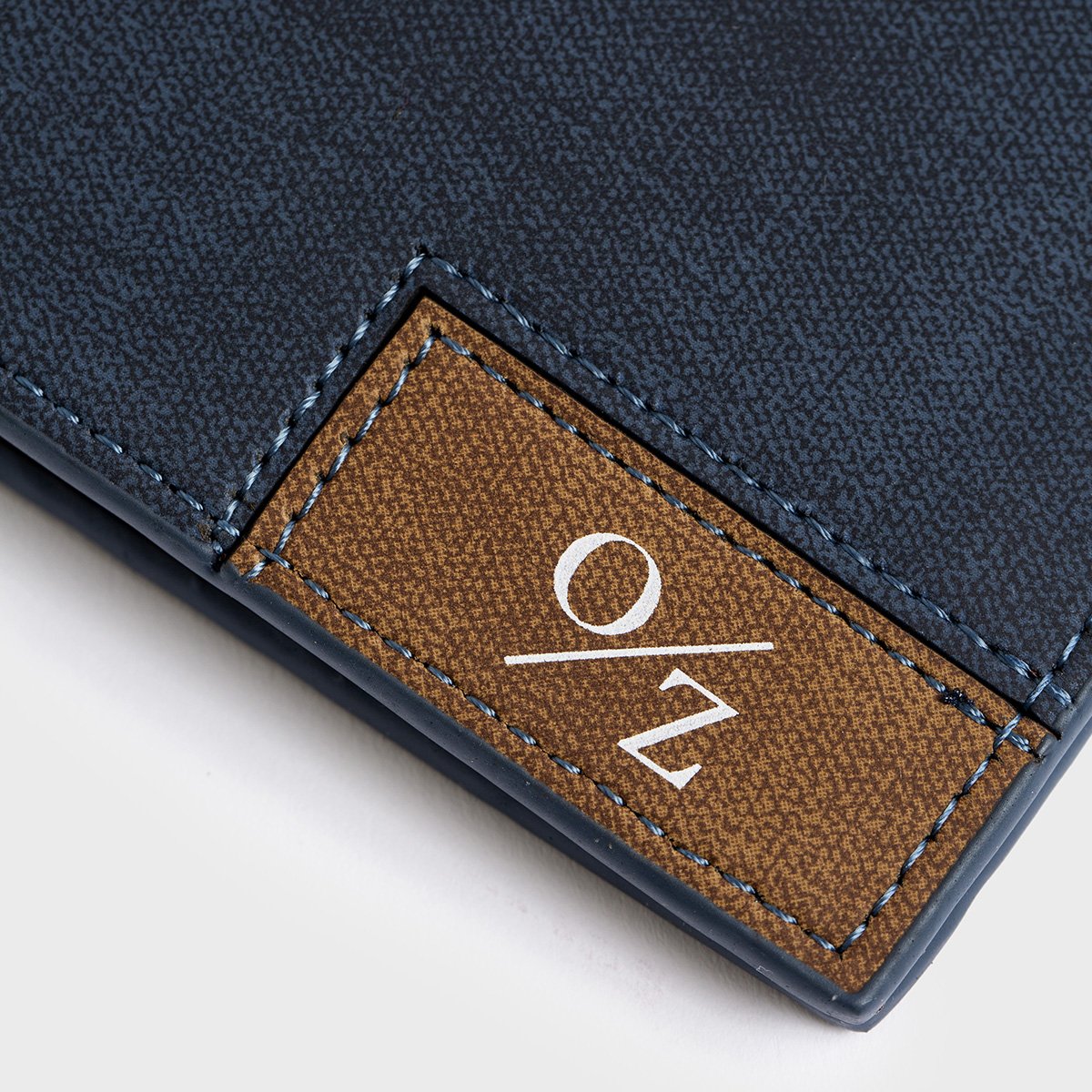 Men's Casual Bi-Fold Wallet in Blue and Grey, showcasing its smooth exterior and multiple pockets.