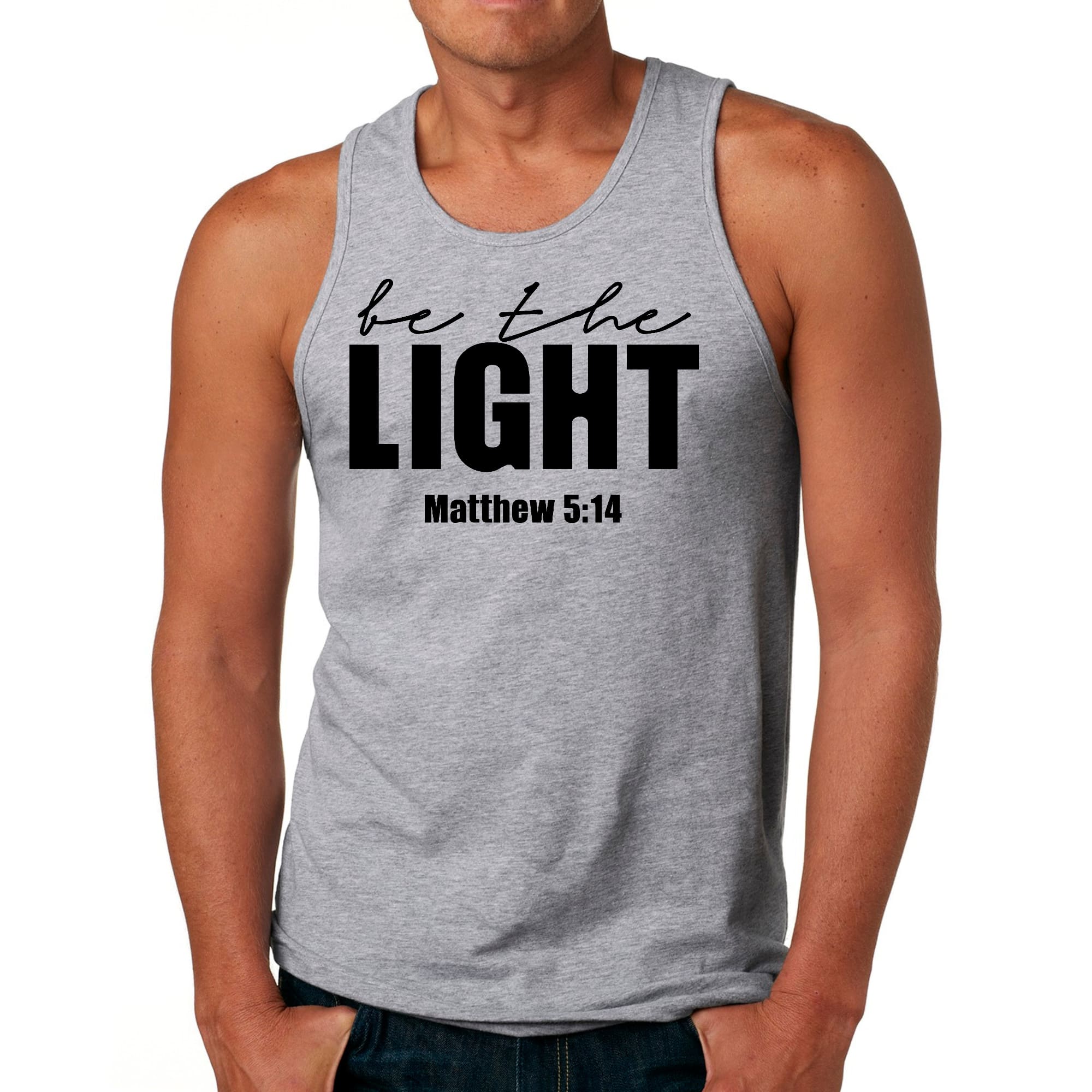 Men's Fitness Tank Top in black featuring 'Be The Light' inspirational graphic design, made from soft preshrunk cotton.