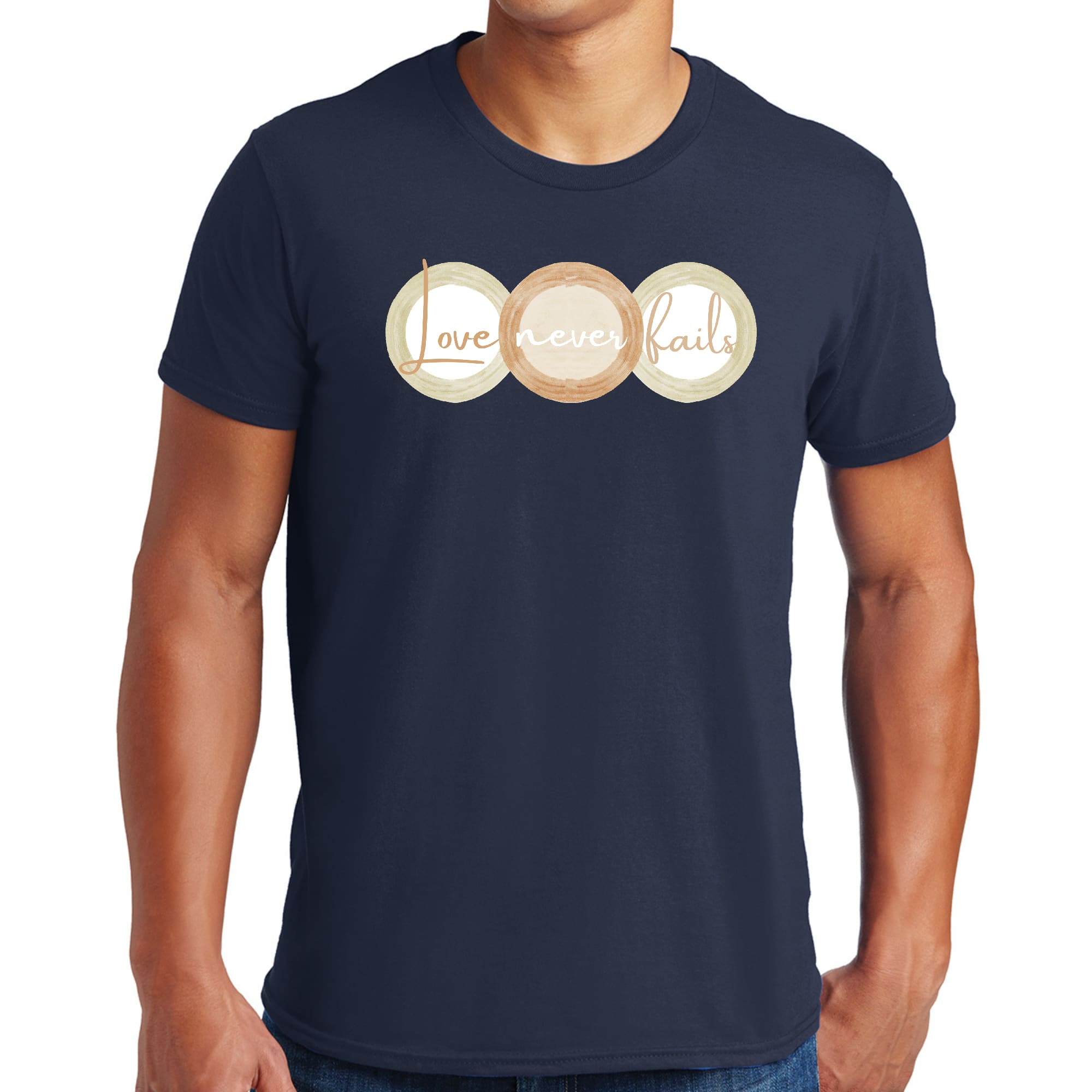 Mens Graphic T-shirt featuring 'Love Never Fails' design in pastel brown, beige, and green circular shapes, made from soft preshrunk cotton.