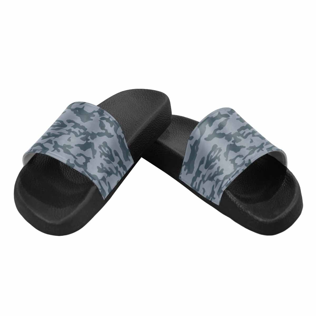 A pair of stylish men's slide sandals featuring durable PVC straps and a soft sole, perfect for indoor and outdoor use.