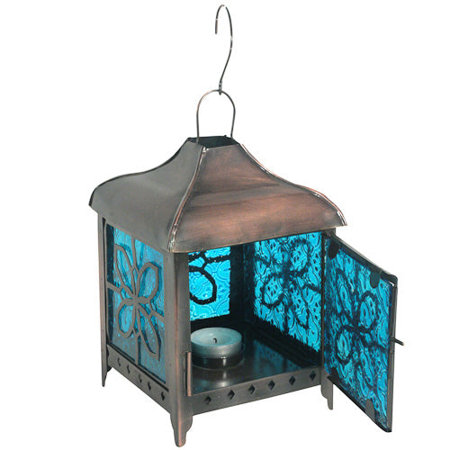 Handcrafted Metal Butterfly Lantern with Blue Glass, showcasing intricate design and eco-friendly materials.