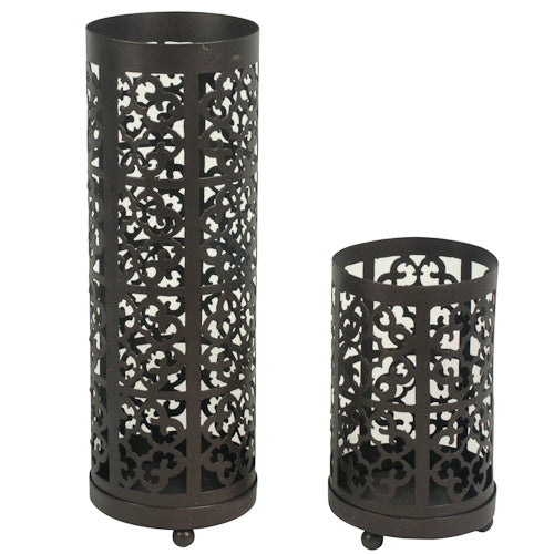 Set of two handcrafted metal candle lanterns with intricate lattice design, showcasing eco-friendly craftsmanship.