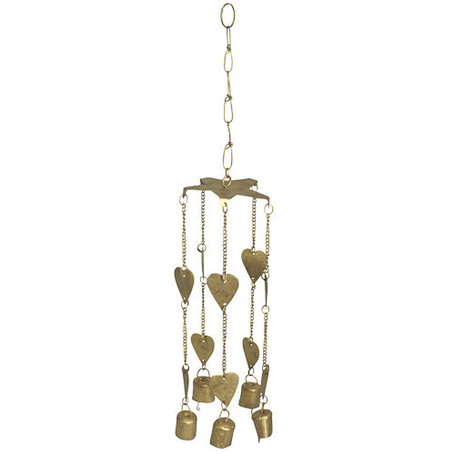 A beautiful Metal Heart Chime with 10 hearts and 5 bells hanging from golden chains, creating a serene garden atmosphere.