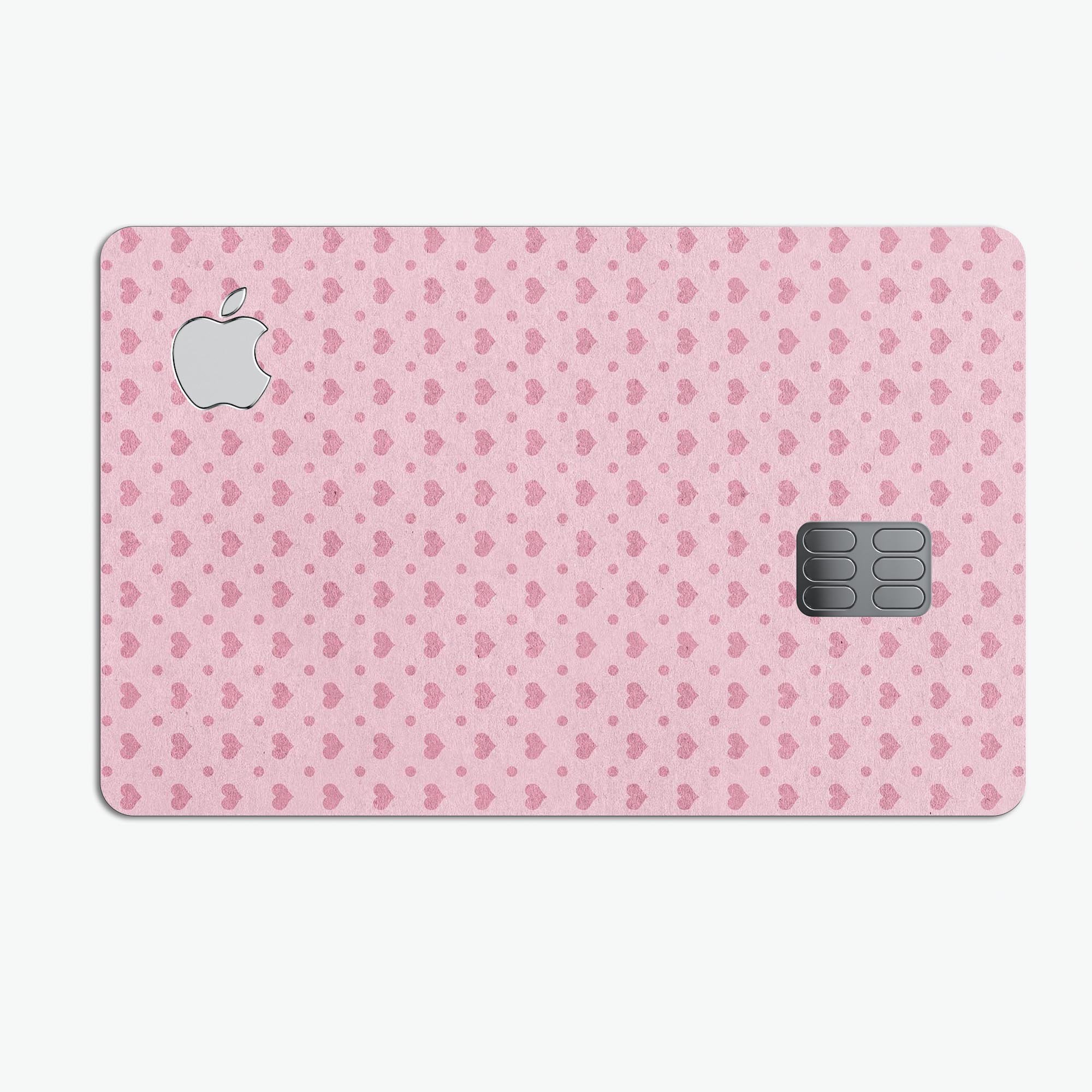 Micro Pink Hearts decal skin for Apple Card, featuring a pale pink background and vibrant heart design.