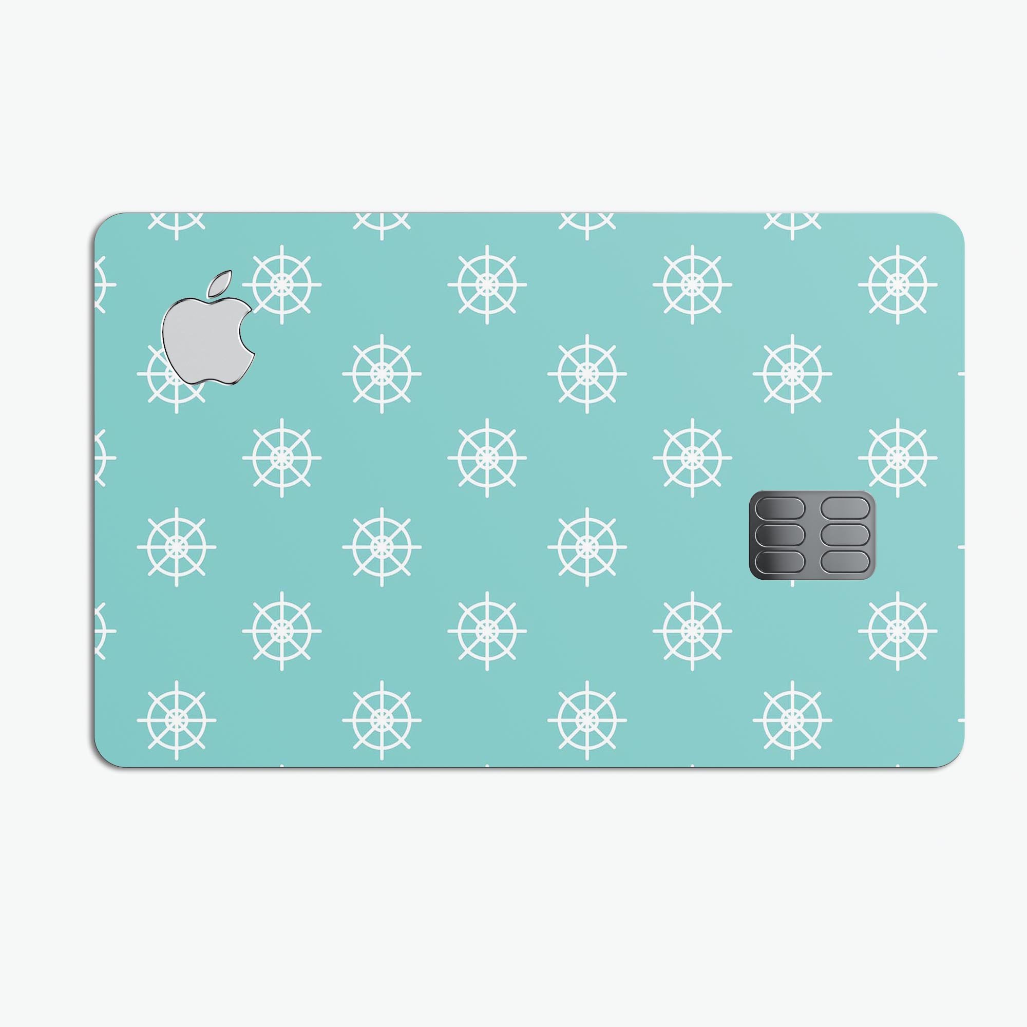 Micro White Ship Wheels Over Teal decal skin for Apple Card, showcasing premium design and protective features.