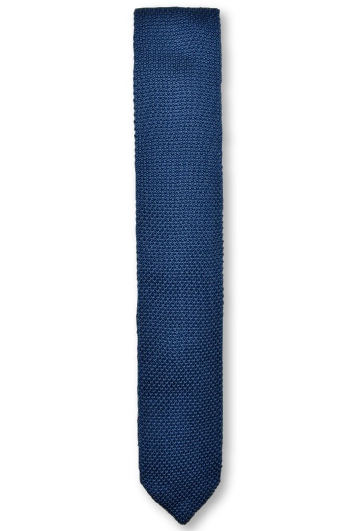 A stylish midnight blue knitted tie with a pointed end, showcasing its texture and elegant color.